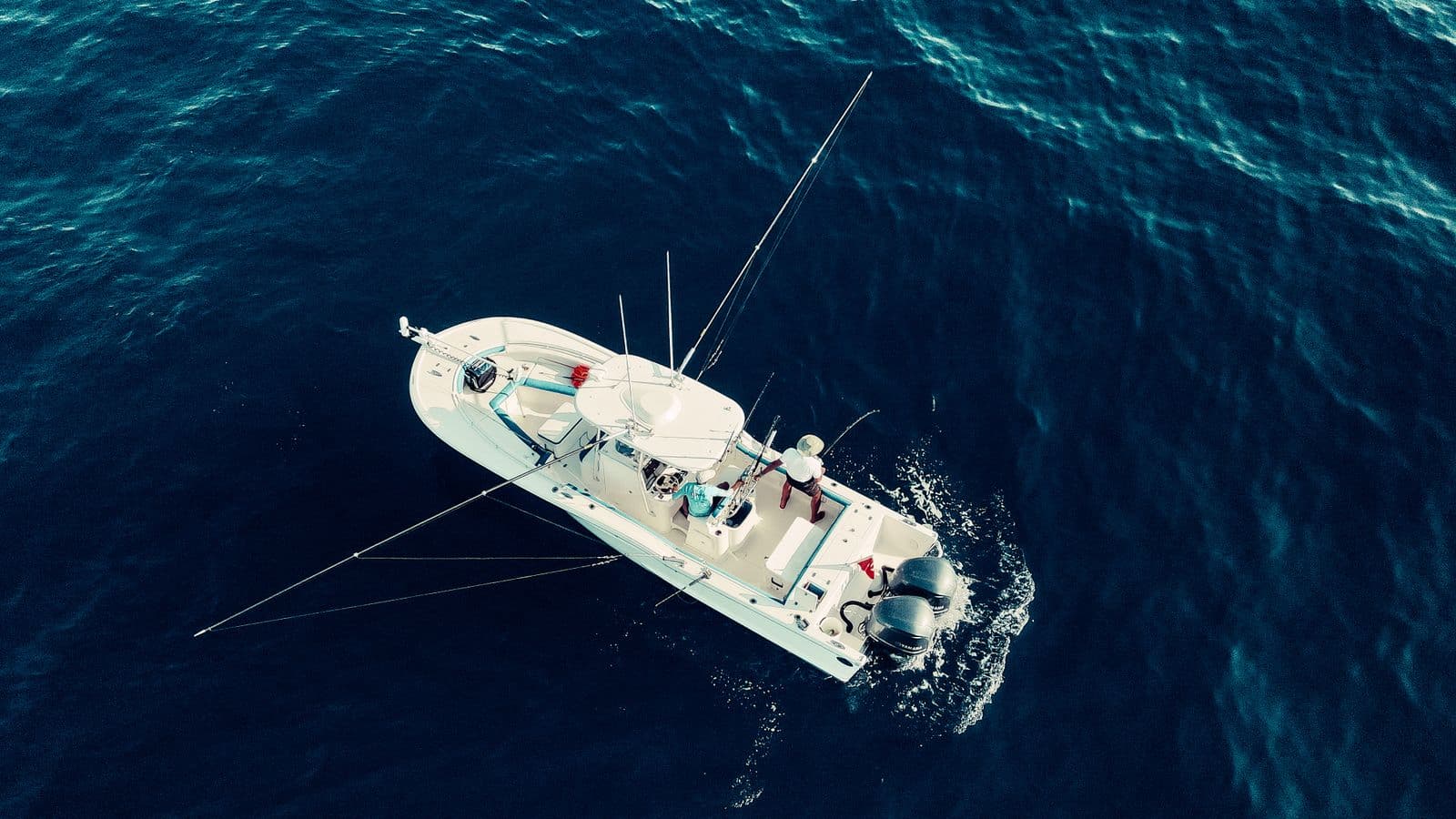 Aerial view of a fishing boat on the deep blue Pacific